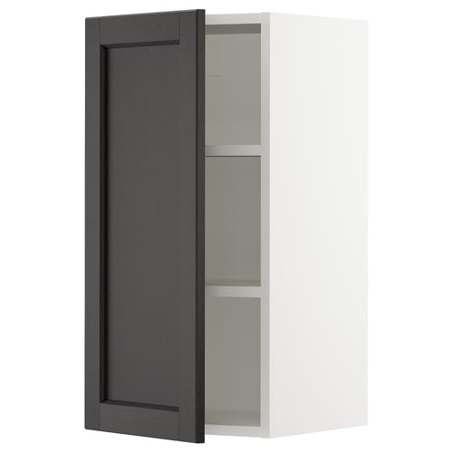 White wall cabinet with open black door and shelf.