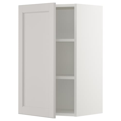 Ikea SEKTION off-white cabinet, standard square shape, white wooden with 3 shelves, clean minimalist design.
