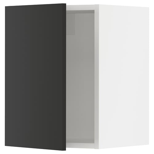 Black ikea SEKTION cabinet door, modern, partially open with soft-close hinge.