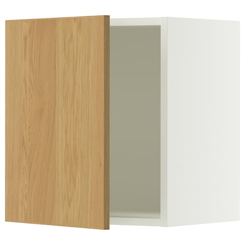Light oak cabinet door, white frame, reversible hinges, ideal for kitchens.