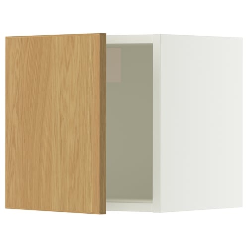 Ikea SEKTION oak cabinet door, part of a modern kitchen unit. Wooden finish, rectangular shape, with light beige painted interior.