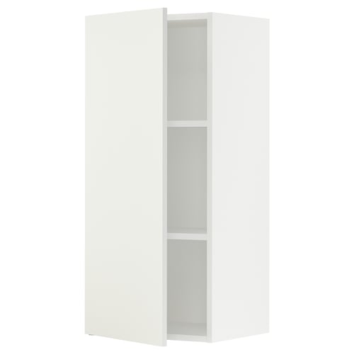 A white SEKTION kitchen corner cabinet with adjustable shelves.