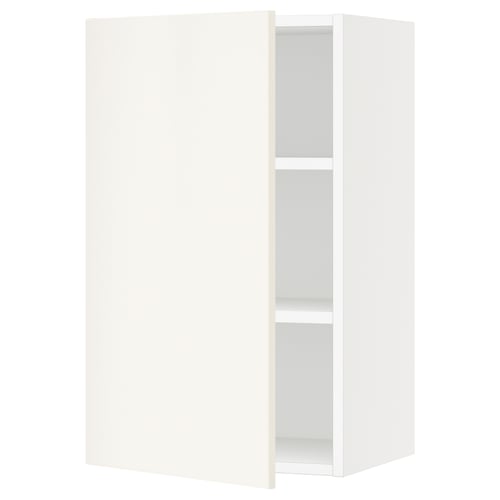 A white SEKTION wall cabinet with two adjustable shelves. It has a modern, minimalist design with clean lines.