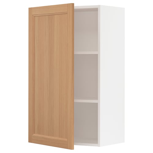 Modern kitchen cabinet with light wood door, white frame, simple design.