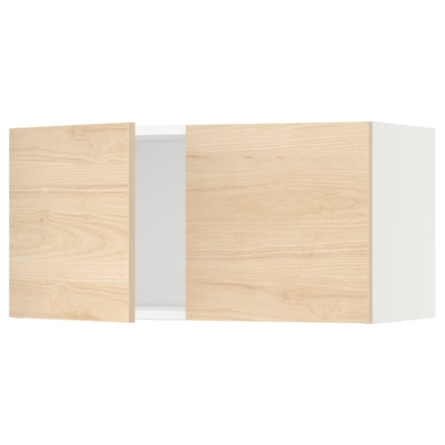 Wooden kitchen cabinet with light ash doors.