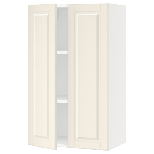 An off-white SEKTION kitchen wall cabinet with two adjustable shelves and bevelled edges.