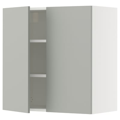 Modern kitchen cabinet, light grey, square shape, with one door open revealing adjustable shelf.