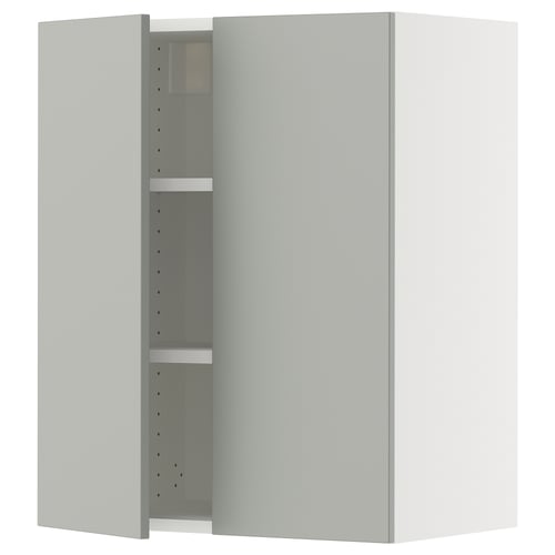 A light grey SEKTION kitchen cabinet with one open door, revealing adjustable shelves inside.