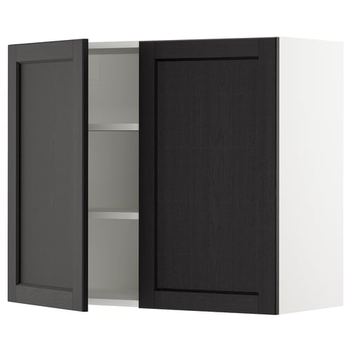 A dark grey kitchen cabinet with one door open, revealing glass shelves inside. The cabinet has a modern, minimalist design.