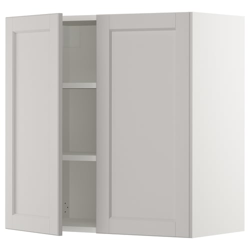 Light grey kitchen cabinet with bevelled door edges.