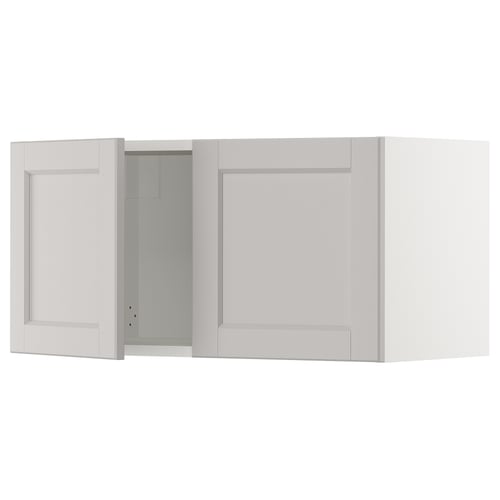 Ikea SEKTION light grey kitchen wall cabinet with one open door, classic design.