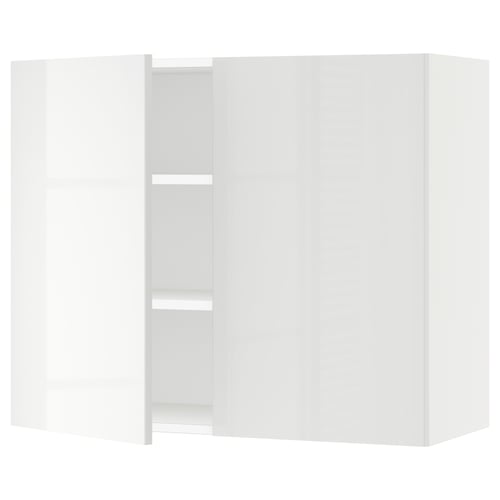 A high-gloss white SEKTION wall cabinet with adjustable shelves.