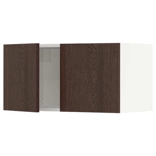 Dark brown wooden cabinet with two visible doors, one open revealing empty space inside.