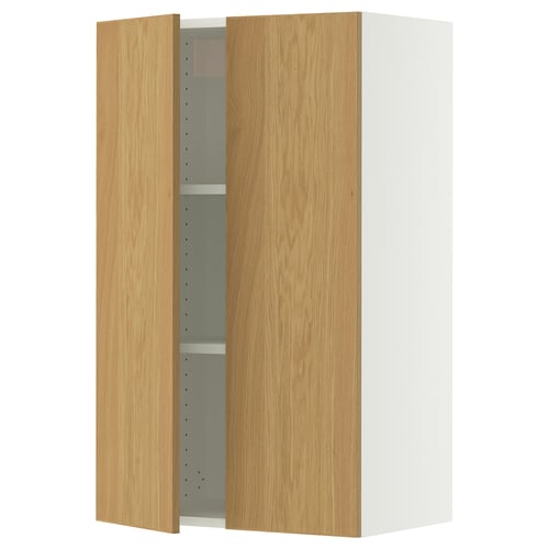 A SEKTION oak wall cabinet with one door open, revealing an adjustable shelf inside. The cabinet is square-shaped with a light wood finish.