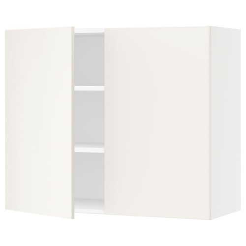 White SEKTION kitchen cabinet with adjustable shelves, smooth design.