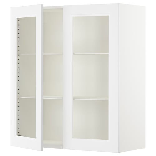 SEKTION white kitchen cabinet with glass doors, adjustable shelves, and soft-closing hinges.