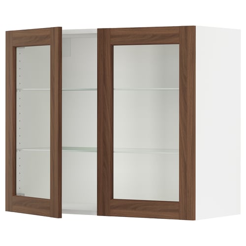 SEKTION kitchen cabinet with walnut glass doors, white frame, and three clear glass shelves.