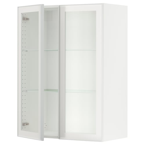 A white SEKTION kitchen cabinet with clear glass doors and metal frames. It has an adjustable shelf and a modern, sleek design.