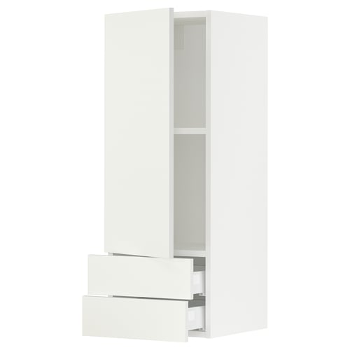 SEKTION white kitchen cabinet with drawers and shelves.