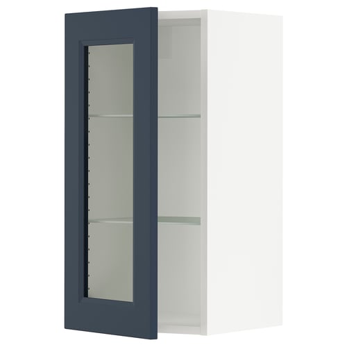 A blue ikea SEKTION kitchen cabinet with a glass door.