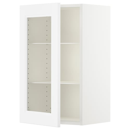 White wall-mount kitchen cabinet with glass door from IKEAs SEKTION series, featuring adjustable shelves.