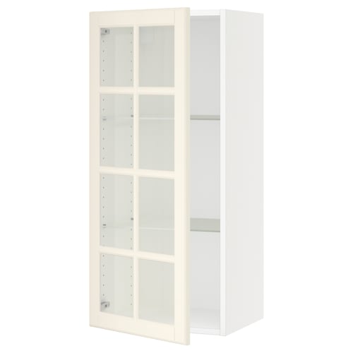 An off-white SEKTION kitchen cabinet with glass doors, square shape, and traditional design.