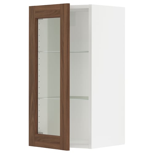 Ikea SEKTION kitchen unit with walnut-style glass door, white frame, adjustable shelves.