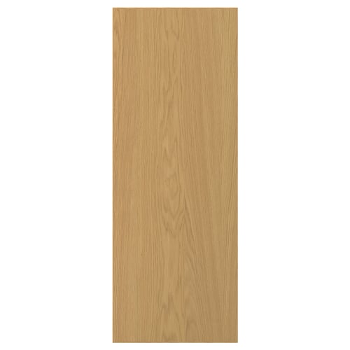 A light-colored wood panel door. Its made of oak veneer and a solid wood edge. The design is simple and rectangular.