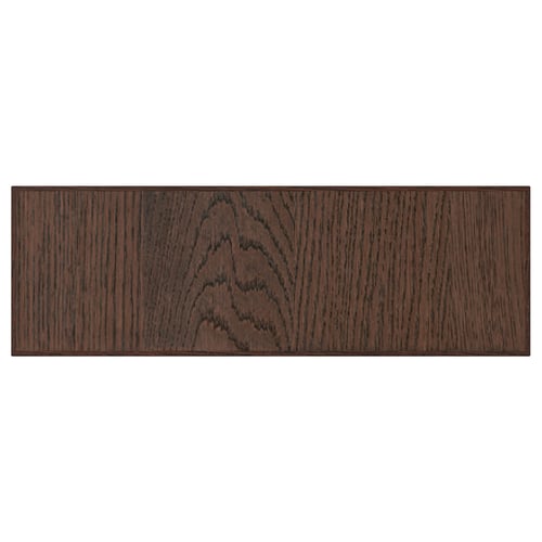Dark brown wooden panel with visible wood grain texture.