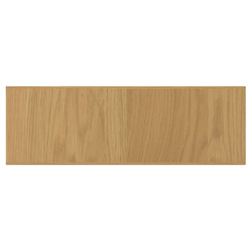 A wooden panel in natural oak colour with a smooth finish.