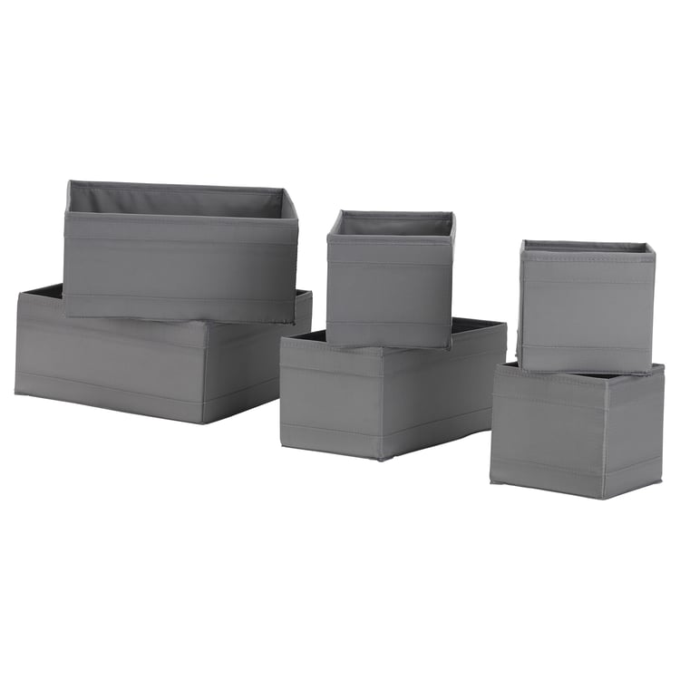 Six grey SKUBB storage boxes in various sizes, stacked neatly to showcase versatility in organising items.
