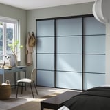 SKYTTA / BOAXEL Walk-in wardrobe with sliding doors, black metal/Mehamn light blue, 98 7/8x45 1/4x94 1/2 "