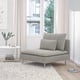 Minimalist living room with SÖDERHAMN chair, side table, lamp, rug.