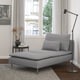 Modern minimalist living room with grey SÖDERHAMN chaise longue, black floor lamp, side table with vase, and black-and-white print on wall.