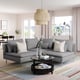 SÖDERHAMN grey sectional sofa, modern design with high legs, sits 3-4, pillows, personal book, and vase on centre table.
