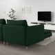 SÖDERHAMN dark green couch in modern living room. Deep seats, tall legs, slim lines. Tv and plant beside.