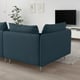 Blue SÖDERHAMN sectional sofa in living room with tv and plant.
