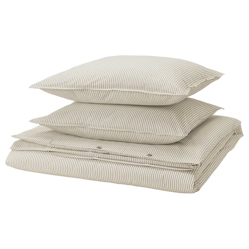 Three beige and white striped pillows stacked neatly.