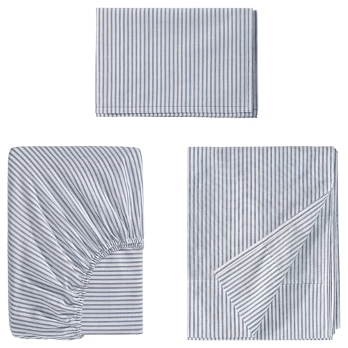Three blue-striped cotton bedding items displayed: flat sheet, fitted sheet, pillowcase.