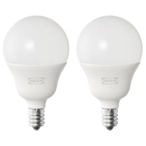 Two ikea SOLHETTA led bulbs, white color, spherical shape, standing upright, branding visible.