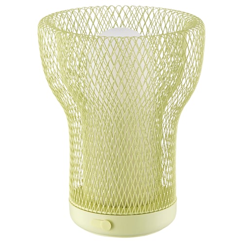 A SOLVINDEN table lamp in green. It a mesh design with a cylindrical base and bulbous shade, giving it a modern and stylish look.