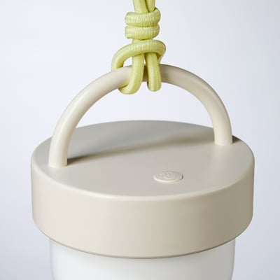 Modern beige solar lamp with lemon rope handle - eco-friendly & simple.