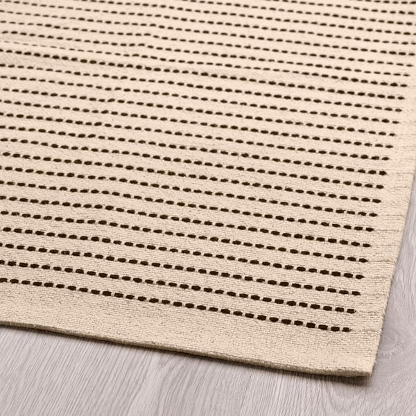 https://www.ikea.com/us/en/images/products/starreklinte-rug-flatwoven-natural-black__1205716_pe907216_s5.jpg?f=s