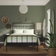 Cosy bedroom with STJÄRNÖ bed, green walls, bedside table, light fixture, wall art, plants.