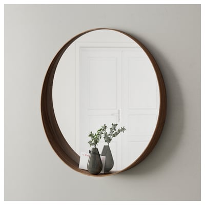Round wooden mirror with shelf at the bottom. Holds vases and cards.