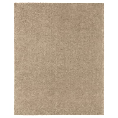 A beige, rectangular STOENSE rug with a simple design, made from polypropylene.