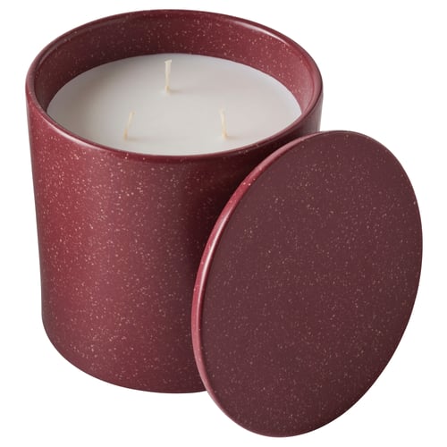 Red speckled ceramic candle jar with lid, white wax, three wicks, decorative, home fragrance.
