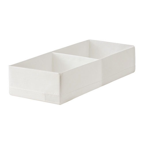 A white STUK storage box with a divided compartment for organising items efficiently.