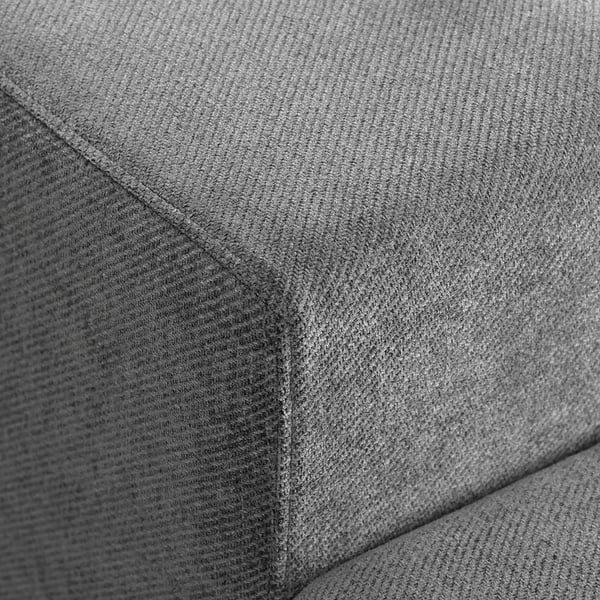 Close-up sofa fabric: soft, textured, deep finish, modern style, cosy feel.