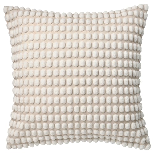 A SVARTPOPPEL off-white cushion cover, featuring a soft, textured, pom-pom design. Square shape, with eco-friendly recycled polyester material.
